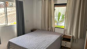 Postel nebo postele na pokoji v ubytování Deise Carla adur