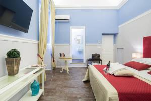 Ένα ή περισσότερα κρεβάτια σε δωμάτιο στο B&B Residenza San Gallo 79