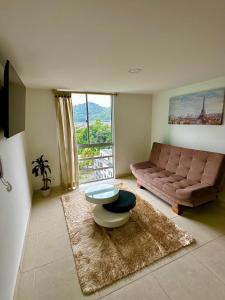 TV a/nebo společenská místnost v ubytování Acogedor y elegante apto central Urban