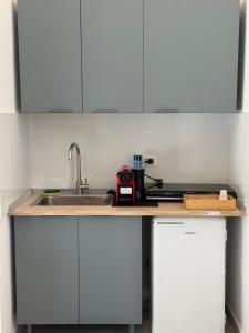 Kuchyň nebo kuchyňský kout v ubytování Dimora Merliani + 13 fotografií