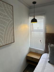 Postel nebo postele na pokoji v ubytování Opulent Escape Secret Nest + 8 fotografií