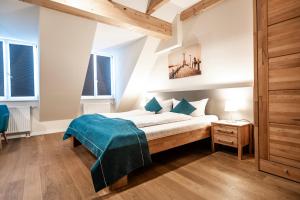 Ένα ή περισσότερα κρεβάτια σε δωμάτιο στο Gasthaus Adler Konstanz