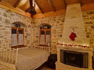 Ένα ή περισσότερα κρεβάτια σε δωμάτιο στο Lithèa House