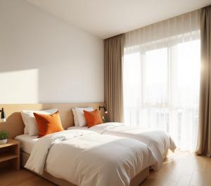 Ένα ή περισσότερα κρεβάτια σε δωμάτιο στο Sayda Apart Aydın