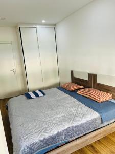 Postel nebo postele na pokoji v ubytování Guesthouse in Queluz Belas