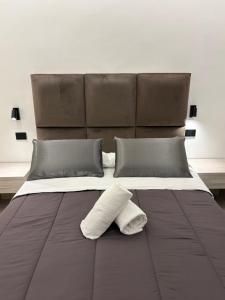 Ένα ή περισσότερα κρεβάτια σε δωμάτιο στο D'ANNUNZIO suites +52 φωτογραφίες