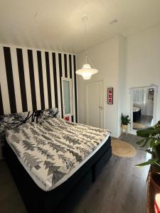 Ένα ή περισσότερα κρεβάτια σε δωμάτιο στο Villa Nordic Snowlight 4 bedrooms, sauna, Wi-Fi and free parking