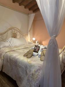 Postel nebo postele na pokoji v ubytování Casa Vacanze Il Puggio + 30 fotografií