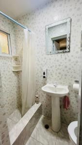 Koupelna v ubytování beachfront apartment