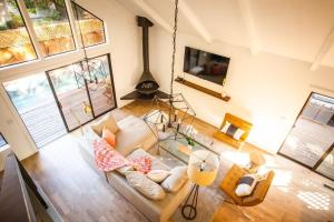 TV a/nebo společenská místnost v ubytování House on Broadway at the Plaza + 21 fotografií