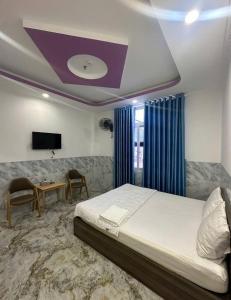 Postel nebo postele na pokoji v ubytování HOTEL Ly Ly