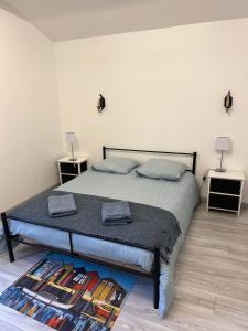 En eller flere senge i et værelse på Villa La Chêneraie 10 personnes