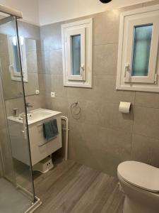 Et badeværelse på Villa La Chêneraie 10 personnes