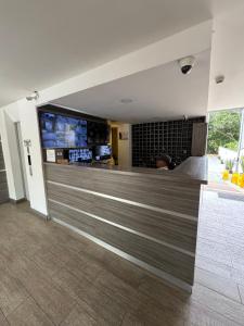 Et tv og/eller underholdning på Apartamento en Armenia, Conjunto residencial Ambar reserva