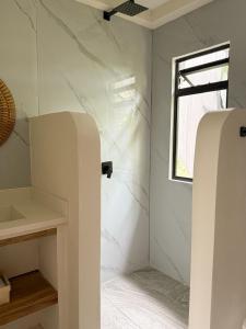 Koupelna v ubytování Calalun + 7 fotografií