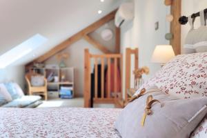 Postel nebo postele na pokoji v ubytování Gîte de charme Beaujoyeulx