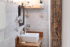 Koupelna v ubytování Gîte de charme Beaujoyeulx + 30 fotografií