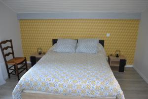 Ένα ή περισσότερα κρεβάτια σε δωμάτιο στο maison 3 classée étoiles à,proximité de Contis Plage