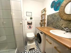 Koupelna v ubytování Lemuria Apartament Szkolna centrum