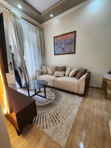 Posezení v ubytování Gena homes bnb + 37 fotografií