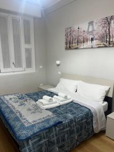 Ένα ή περισσότερα κρεβάτια σε δωμάτιο στο Appartamento Elena