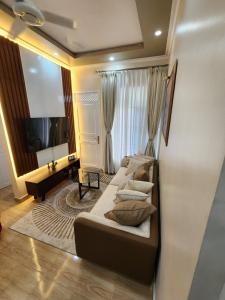 TV a/nebo společenská místnost v ubytování Gena homes bnb