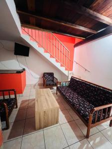 TV a/nebo společenská místnost v ubytování Hermoso apartamento duplex en el centro histórico de San Gil, 5