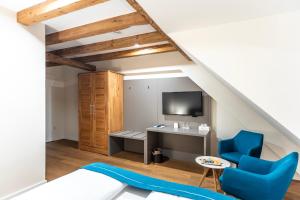 Μια τηλεόραση ή/και κέντρο ψυχαγωγίας στο Gasthaus Adler Konstanz