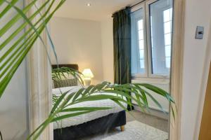 En eller flere senge i et værelse på Chapel hideaway