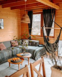 Posezení v ubytování Pastelova Krova - domki w Bieszczadach