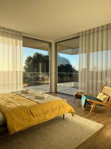 Postel nebo postele na pokoji v ubytování Villa Mar & Luz, Porto, Mindelo Beach