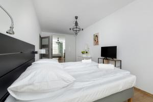 Postel nebo postele na pokoji v ubytování Balticus by Solarento + 49 fotografií