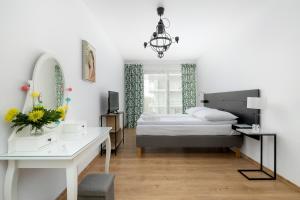 Postel nebo postele na pokoji v ubytování Balticus by Solarento