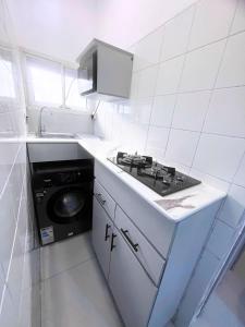 Η κουζίνα ή μικρή κουζίνα στο Addictive Sanctuary