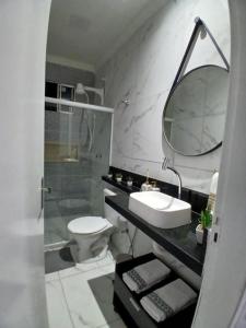 Koupelna v ubytování Flat Bastos Residence + 3 fotografie