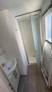 Ένα ή περισσότερα κρεβάτια σε δωμάτιο στο Mobil home