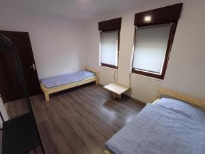 Postel nebo postele na pokoji v ubytování Marele + 2 fotografie