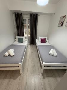 Postel nebo postele na pokoji v ubytování Siena Lux Apartment + 34 fotografií