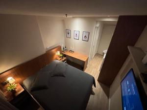 TV a/nebo společenská místnost v ubytování Transamérica Executive Campos dos Goytacazes