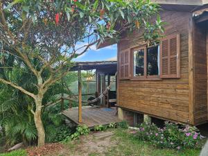 Zahrada ubytování Recanto dos Bambus - Cabana na Praia do Rosa