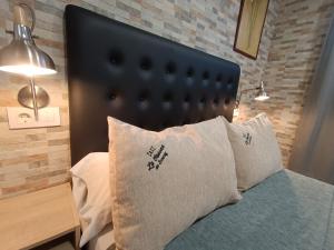 Postel nebo postele na pokoji v ubytování ESTUDIO FAMILIAR En EZCARAY