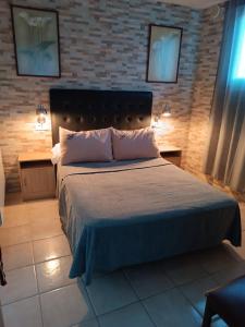 Postel nebo postele na pokoji v ubytování ESTUDIO FAMILIAR En EZCARAY