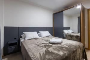 En eller flere senge i et værelse på Com piscina próximo a Vila Germânica RN4960 + 13 billeder