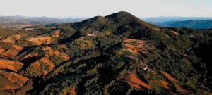 an aerial view of a mountain with trees and houses at Konak ispod Subjela in Ševrljuge