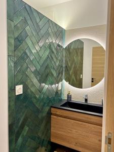 Koupelna v ubytování Magnifique appartement au pied de la citadelle + 7 fotografií