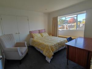 Postel nebo postele na pokoji v ubytování Epsom House close to CBD