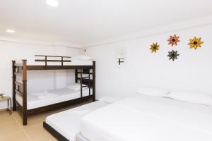 Ένα ή περισσότερα κρεβάτια σε δωμάτιο στο El Velero Apartamentos By DANP