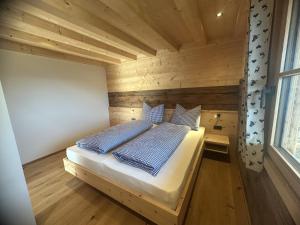 Ένα ή περισσότερα κρεβάτια σε δωμάτιο στο Riemhof +2 φωτογραφίες