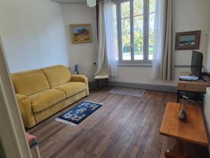 Posezení v ubytování Au calme, 2 grandes chambres, 65m2 , devant le canal, animaux ok