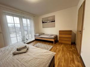 Postel nebo postele na pokoji v ubytování Apartmán Mařinka